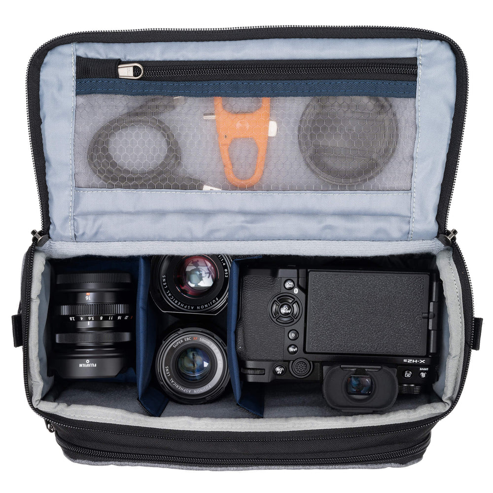 
                  
                    Fits one standard mirrorless body plus 2 to 3 lenses: short to medium f/4 zooms or short to medium primes.
                  
                