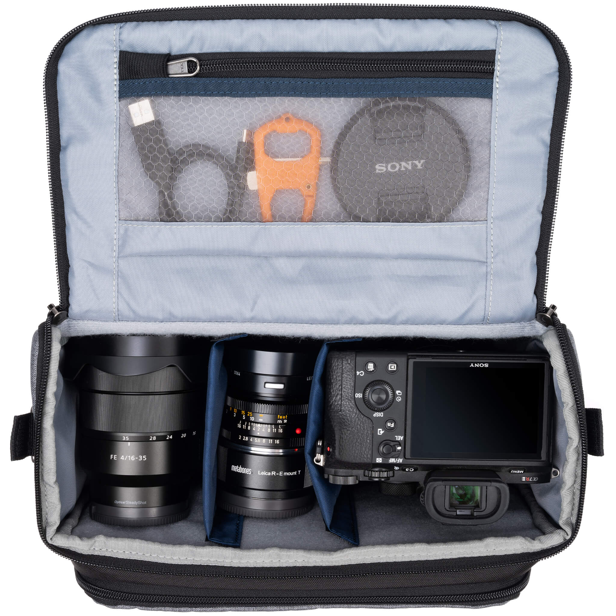 Fits one standard mirrorless body plus 2 to 4 lenses: short to medium f/4 and f/2.8 zooms or short to medium primes.