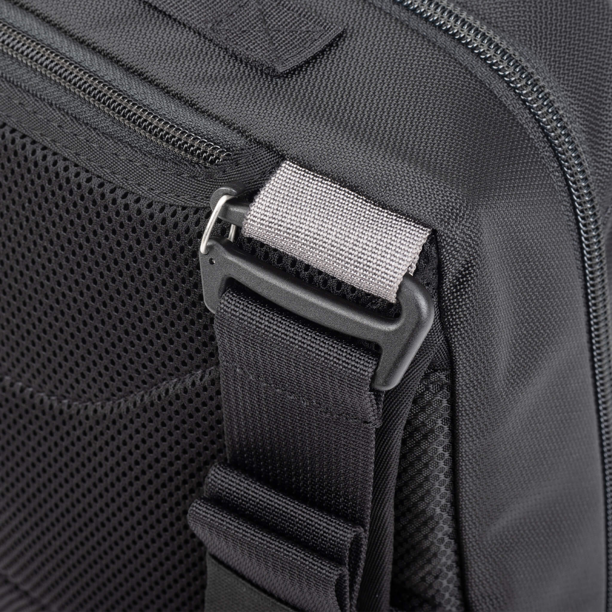 Multiple carry styles are achieved using double-gatekeeper clips and webbing attachment combinations