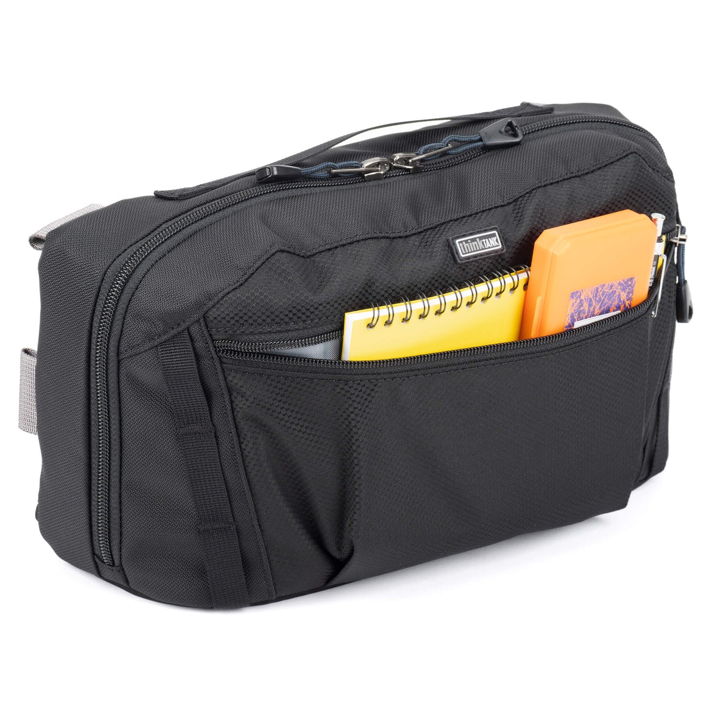 
                  
                    Front pleated zippered pocket
                  
                