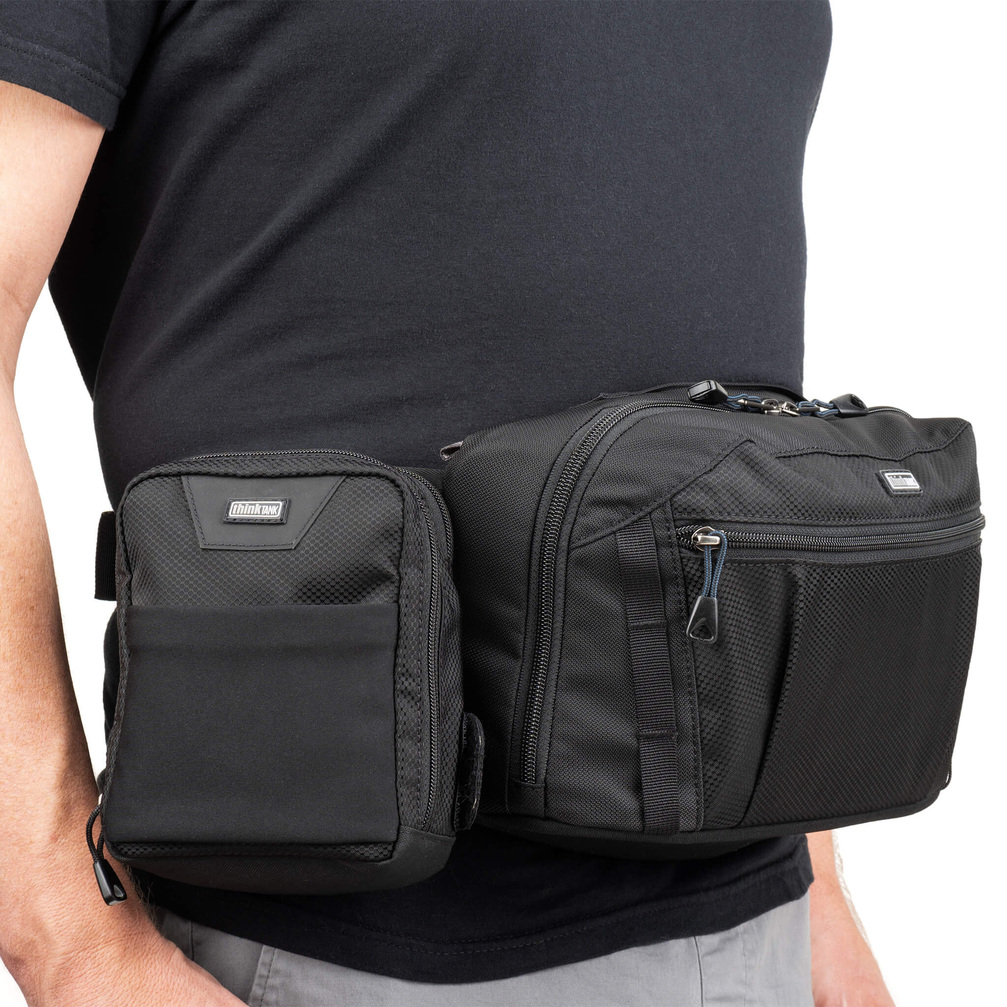 Side rail on waist belt accommodates a modular pouch