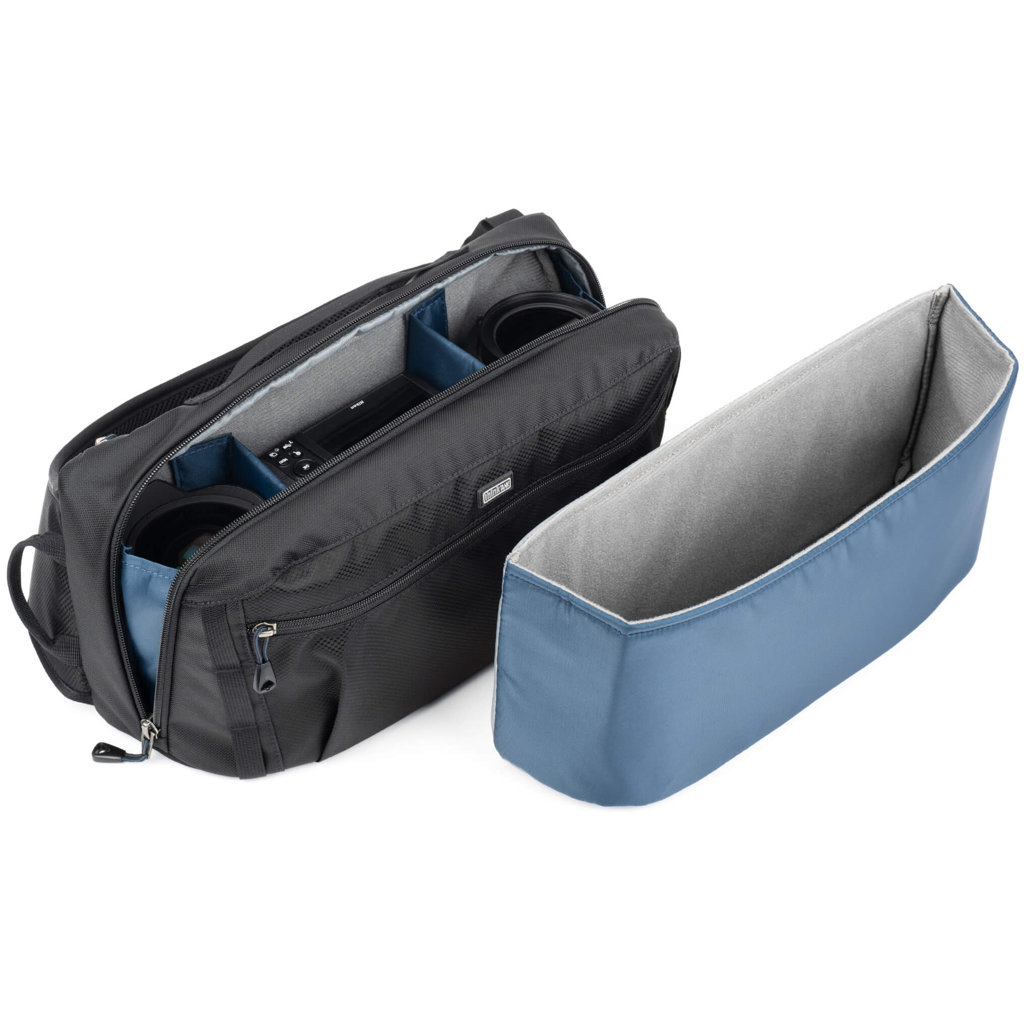 Removable interior padded insert for photographers who need less foam to increase space in the bag