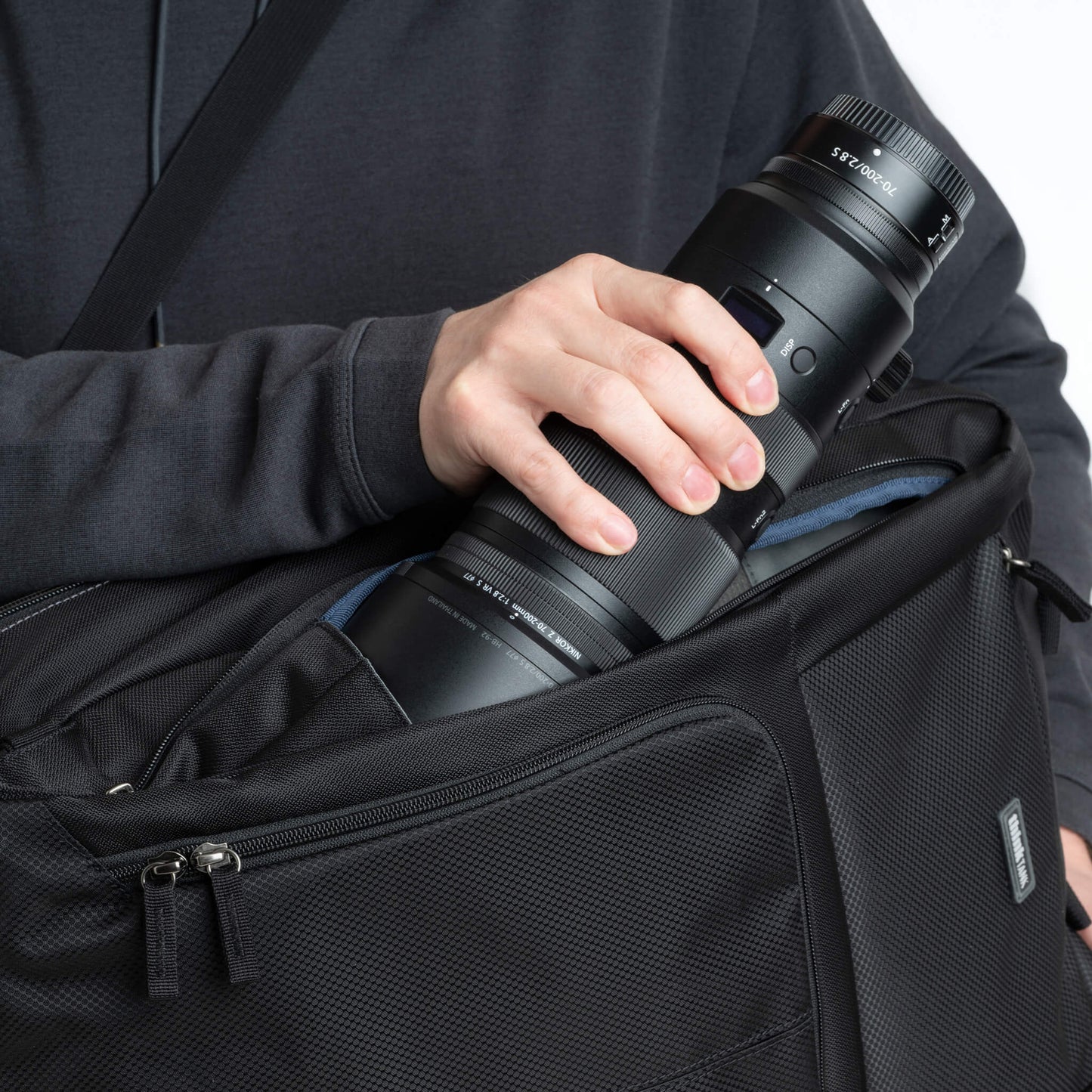 
                  
                    Quick-access front pockets fit up to a 70-200mm f/2.8 for fast lens changes
                  
                