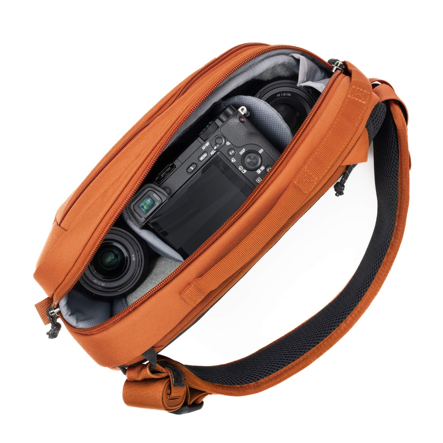 Fits 1 body (ungripped) and 2 to 3 lenses; 1 to 2 small zooms