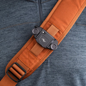 Camera clip rail on the shoulder strap supports popular attachment systems