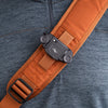 Camera clip rail on the shoulder strap supports popular attachment systems