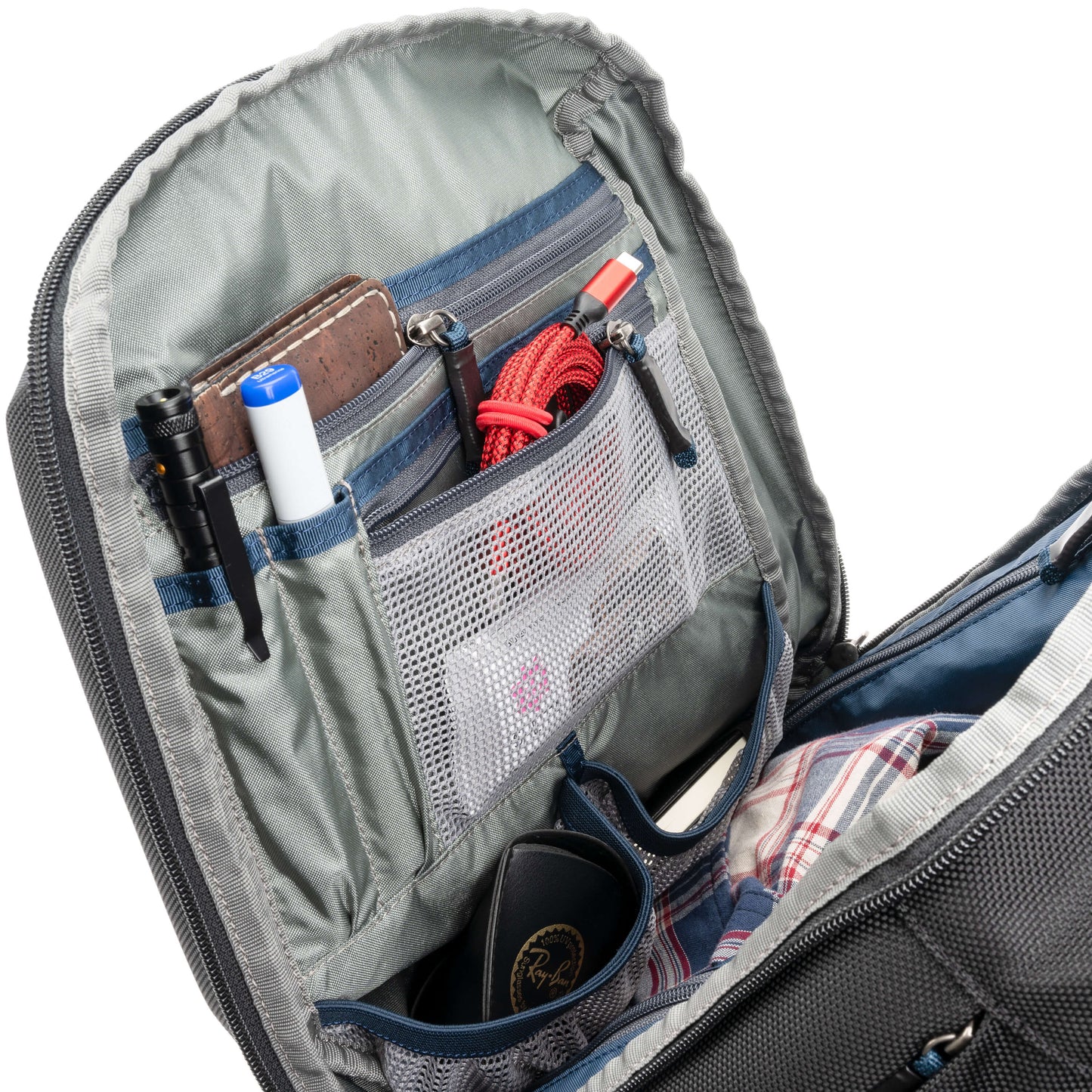
                  
                    Front compartment organizer with two zippered pockets, one mesh and one fabric and two stretch mesh pockets under the organizer for additional items
                  
                