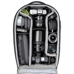 Fits 1 gripped body plus one standard-size body attached to lenses, plus an additional 4-6 lenses and accessories.