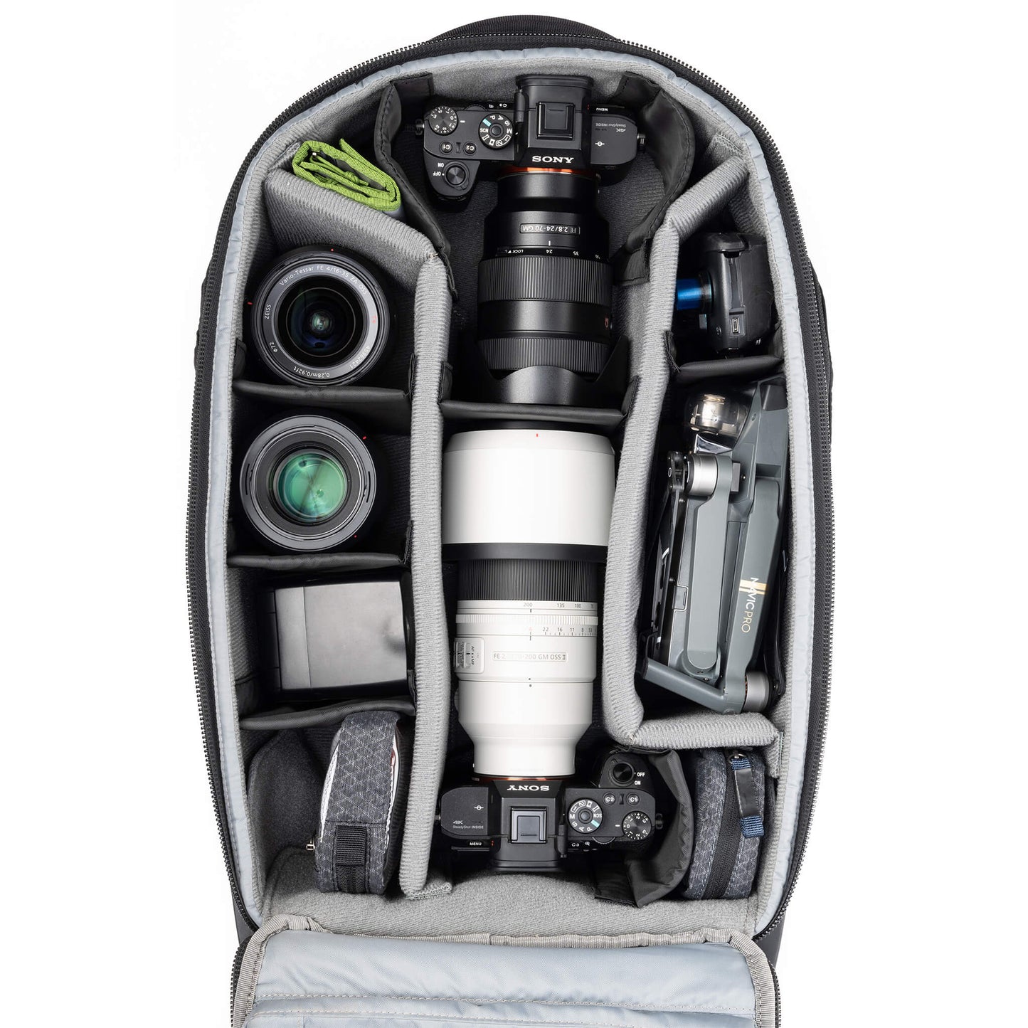 Fits 1 gripped body plus one standard-size body attached to lenses, plus an additional 4-6 lenses and accessories.