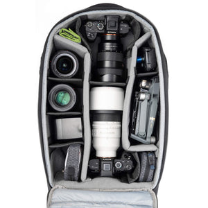 Fits 1 gripped body plus one standard-size body attached to lenses, plus an additional 4-6 lenses and accessories.
