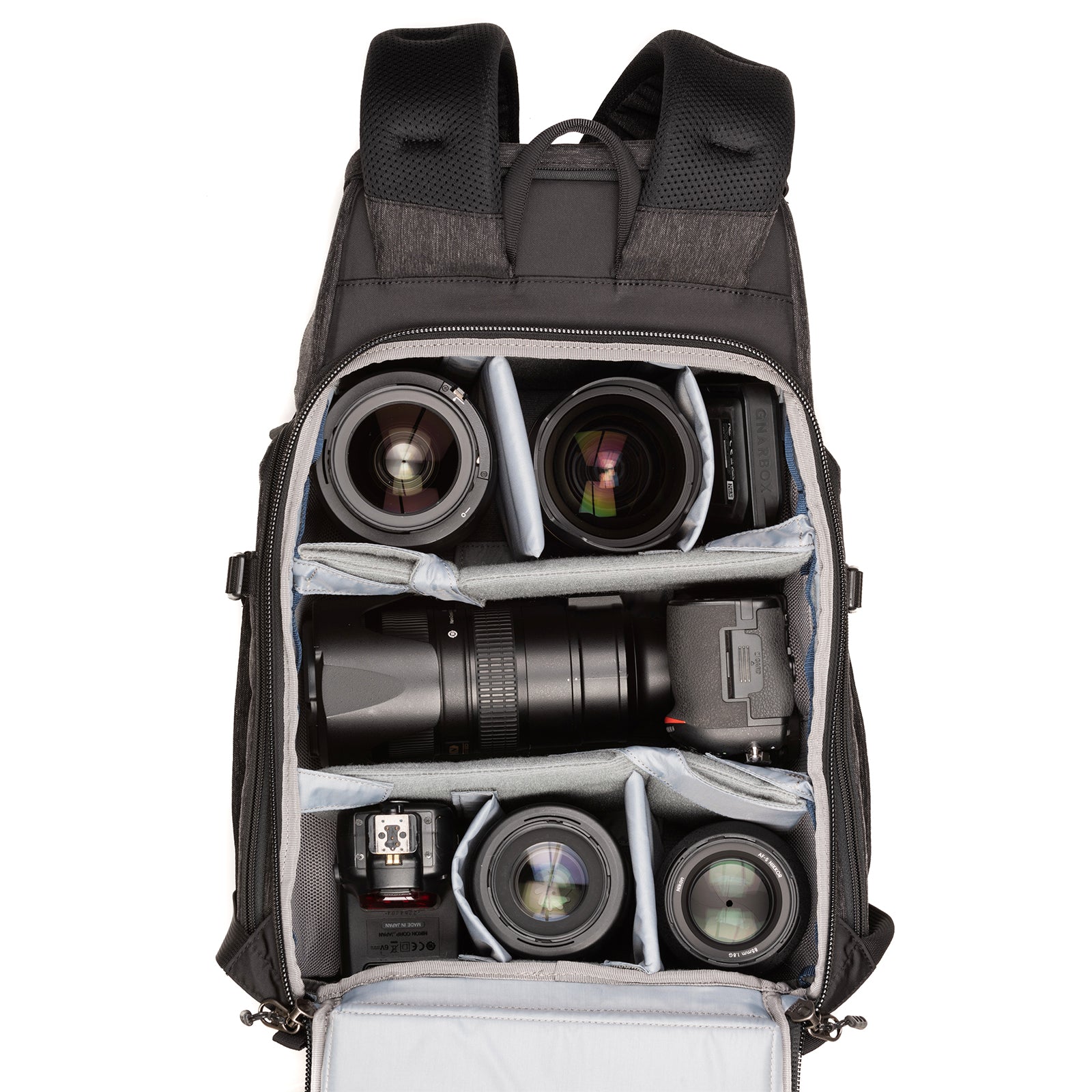 Nikon D750 with 70–200mm f/2.8 attached, 24–70mm f/2.8, 14–24mm f/2.8, 105mm f/2.8 macro, 35mm f/1.4, SB900 strobe and a 15” laptop