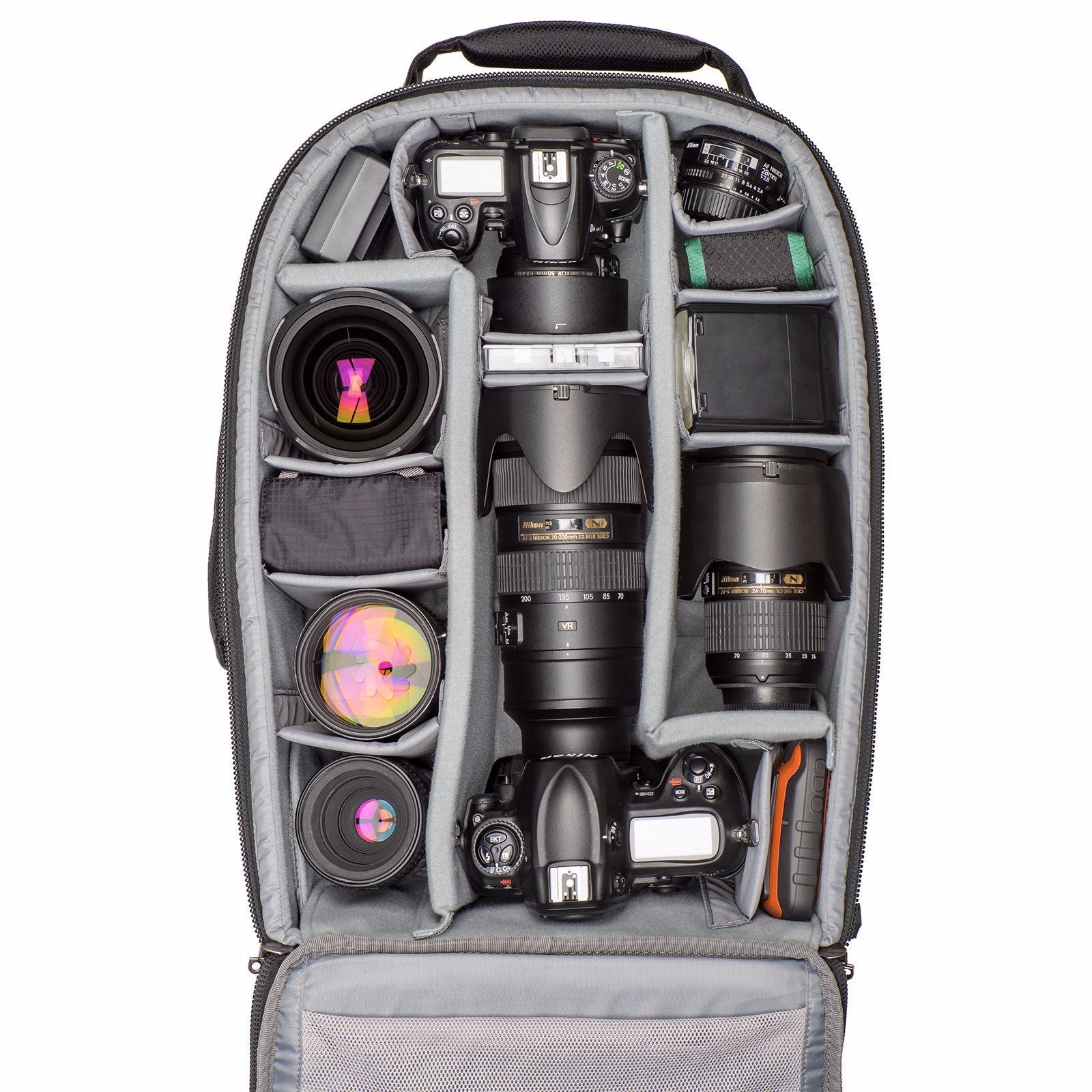 Nikon DSLR bodies with lenses attached, five additional lenses, flash, and accessories