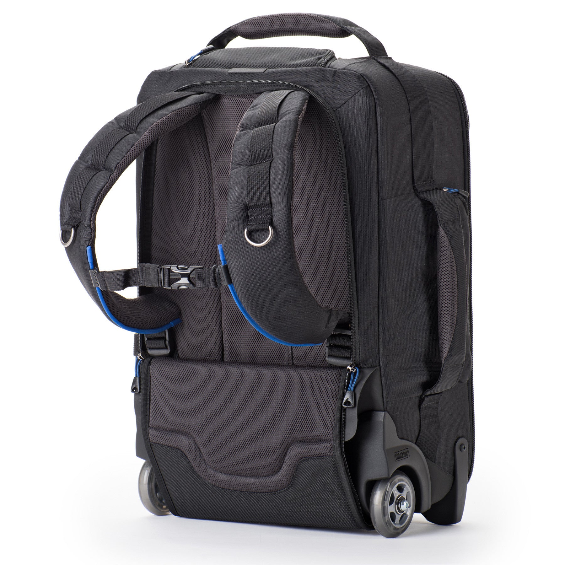Integrated backpack straps with comfortable shoulder harness and back panel padding