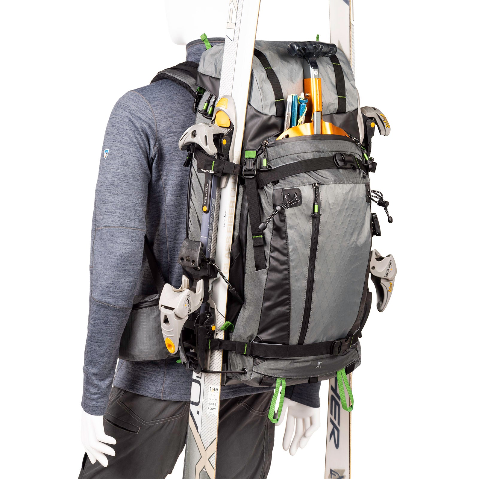 Snowboard or ski carry with tuck-away, protected edge lash straps