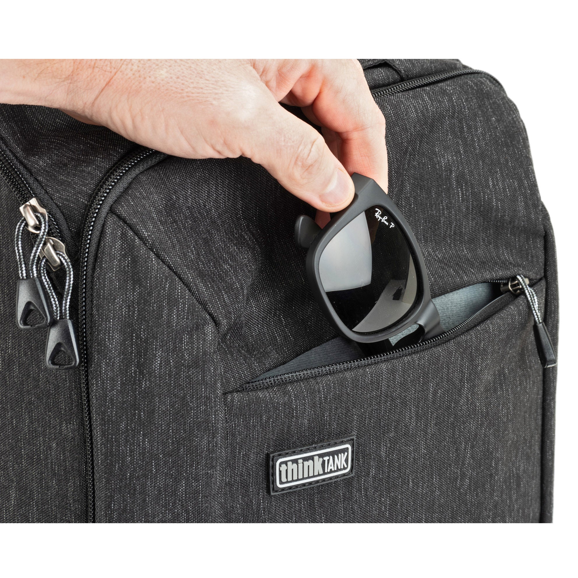Microfiber-lined exterior pocket for today’s plus-sized phones or sunglasses