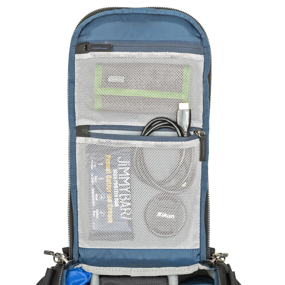 
                  
                    Main compartment pockets give you quick access to filters, batteries, cards, etc.
                  
                