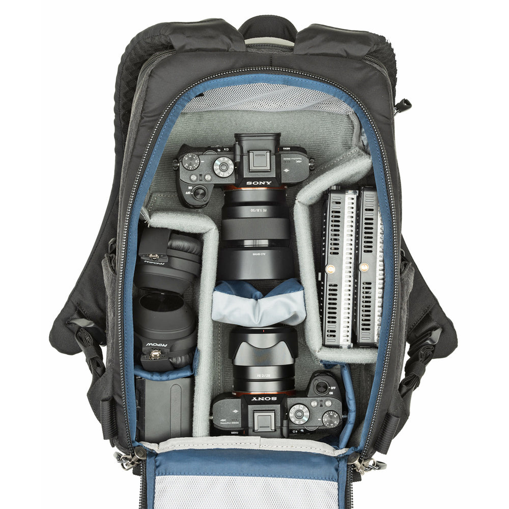 
                  
                    1–2 ungripped DSLR or Mirrorless body with lens attached up to a 70–200mm f/2.8, 1–3 additional lenses, a strobe, a 13” laptop, plus personal gear
                  
                