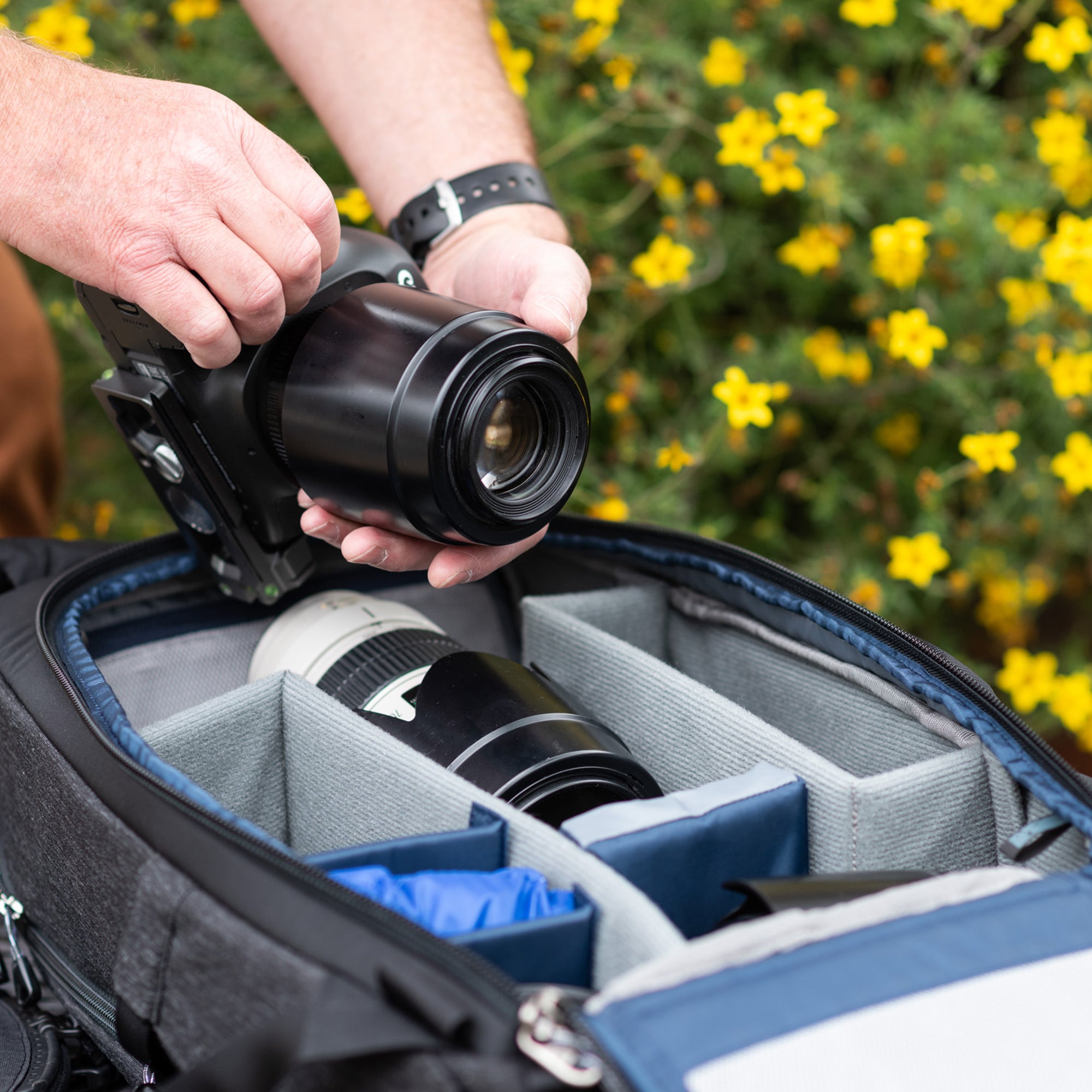 Zippered back panel provides full access to camera gear