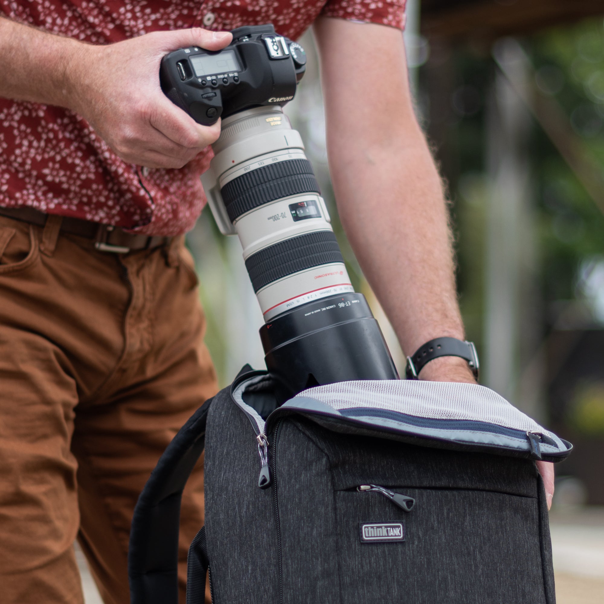 Top zippered panel provides quick access to essential camera gear