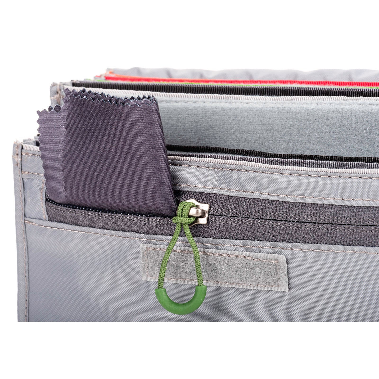 Interior zippered pocket for small accessories, like a lens cloth