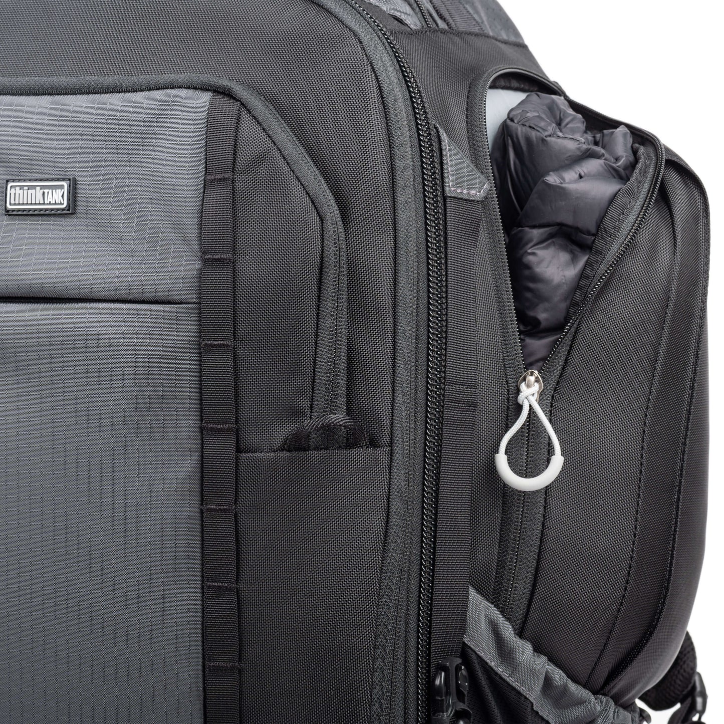 
                  
                    Improved large zippered pocket on side now fits accessories or personal gear
                  
                