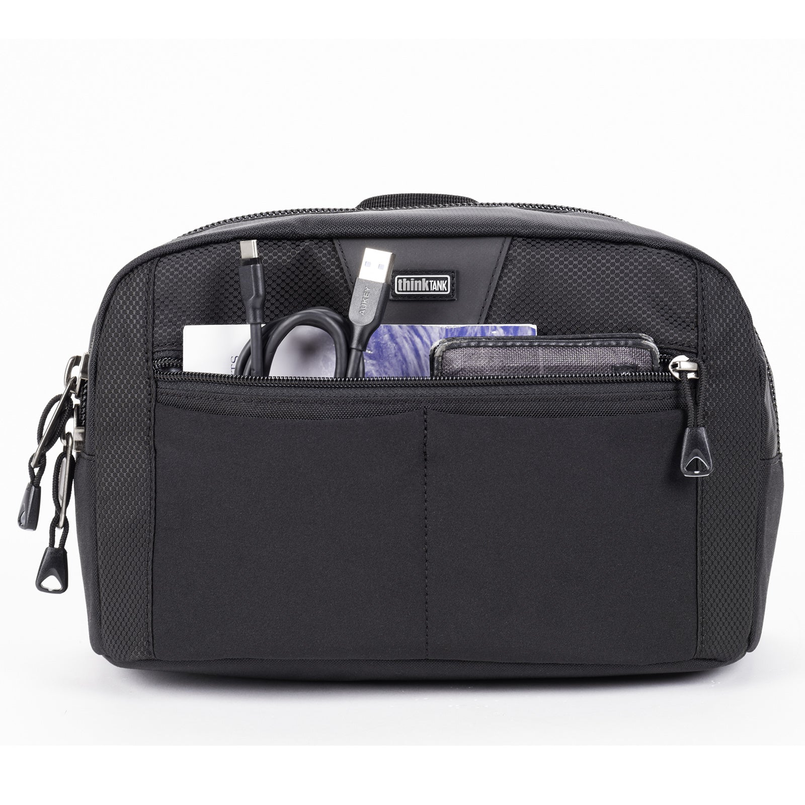 Zippered front organizer pocket