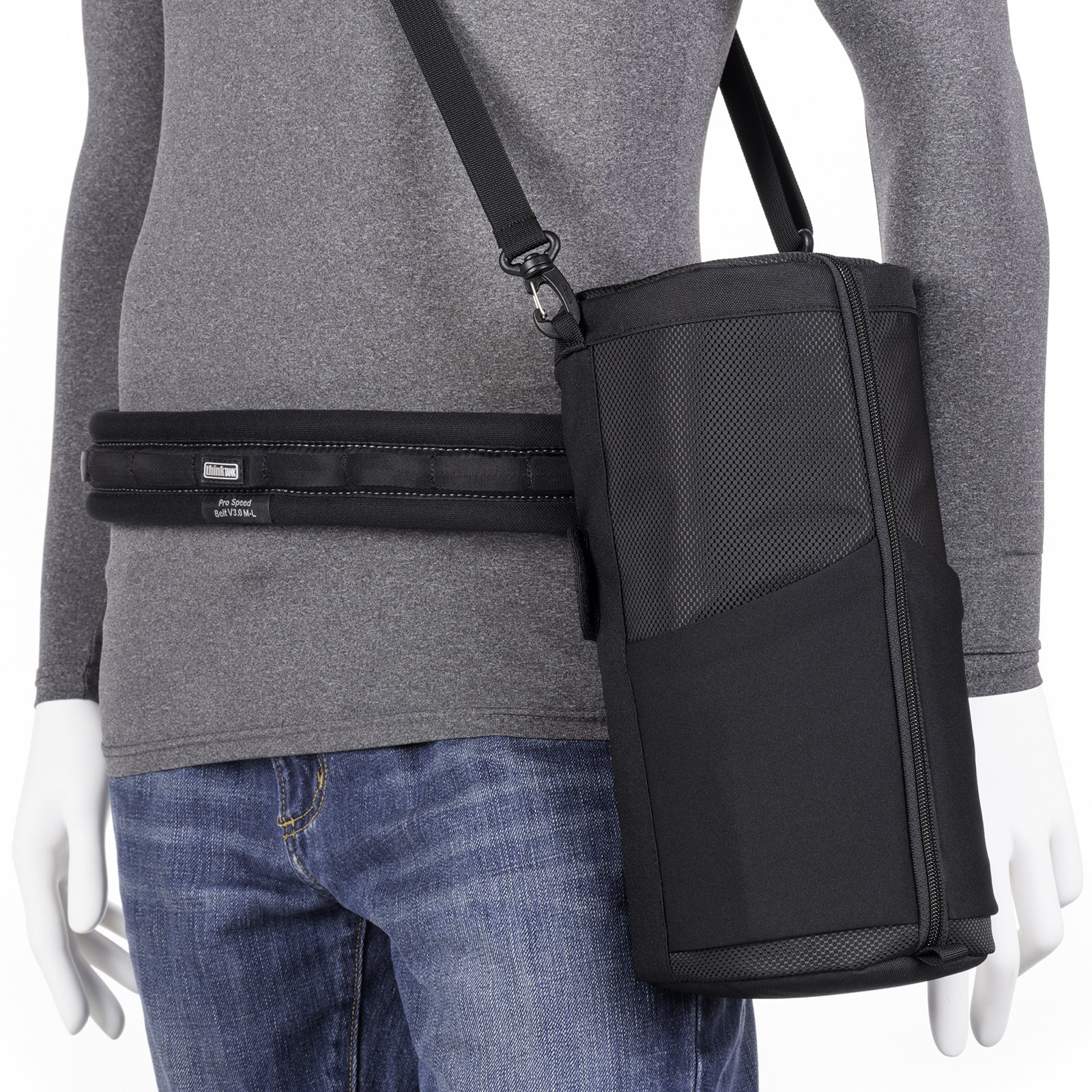 Pouch rotates or locks on a belt. Shoulder Strap included.