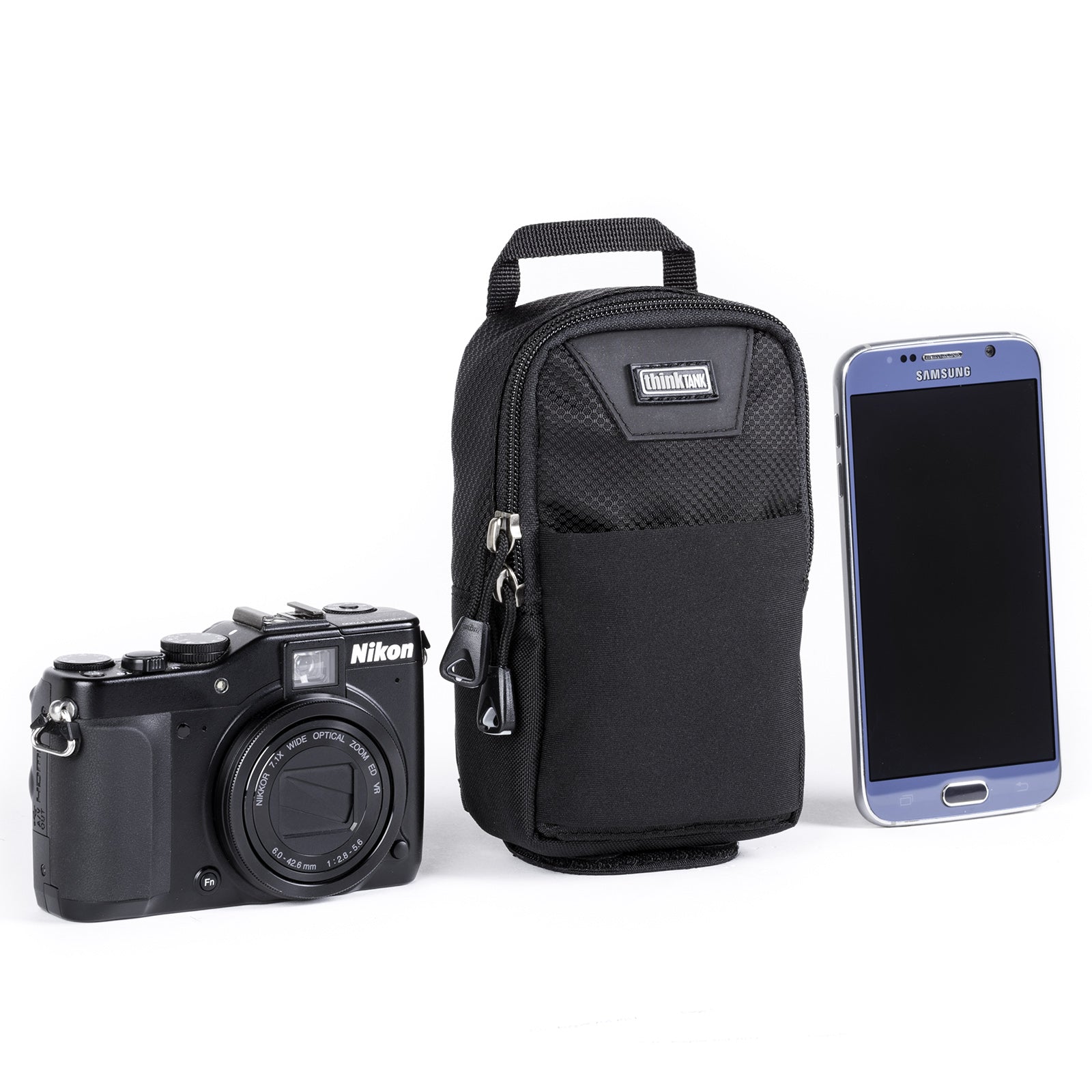 Carries a smartphone, professional point and shoot camera, etc