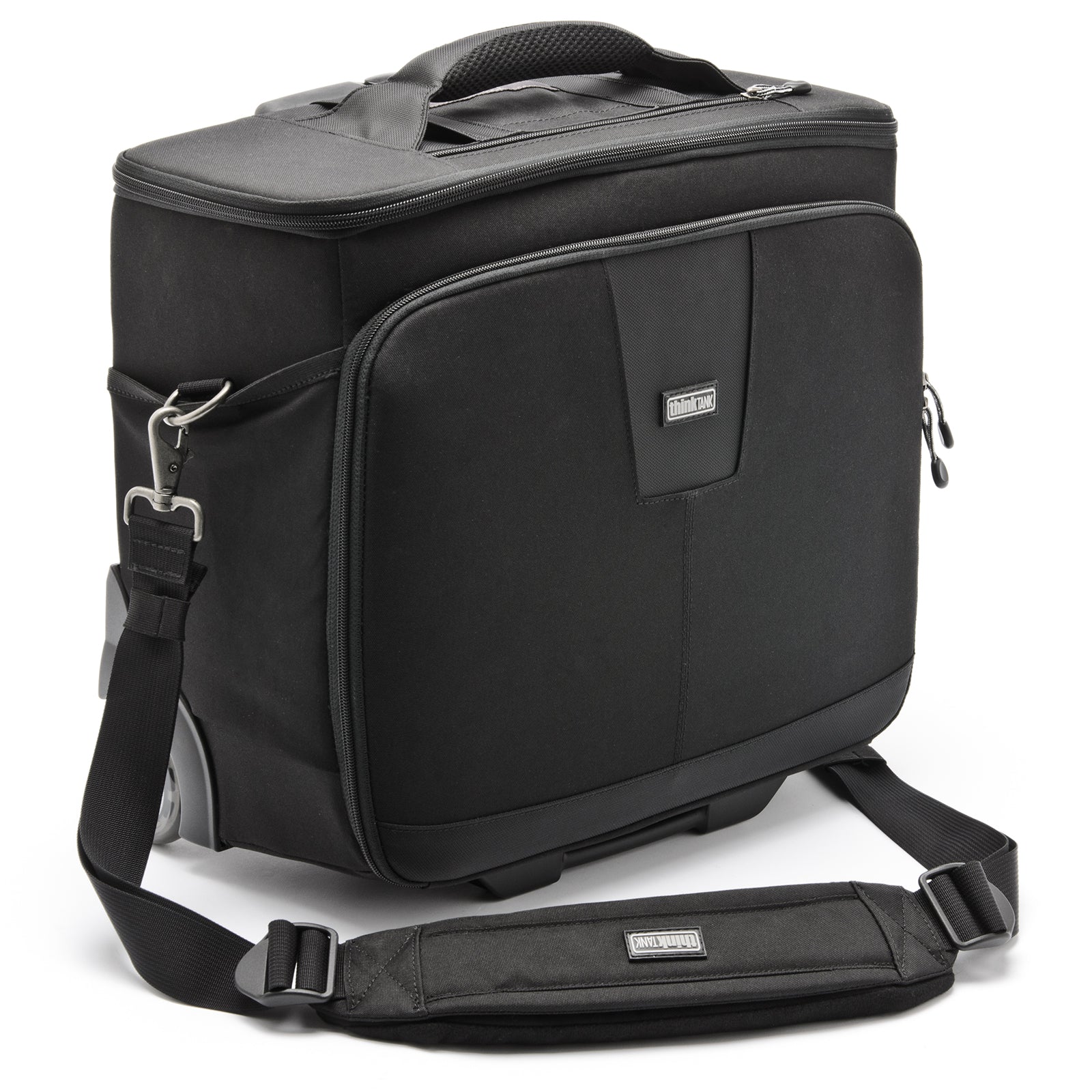 Shoulder strap included. Doubles as a piggy-back strap for attaching bag to rolling luggage