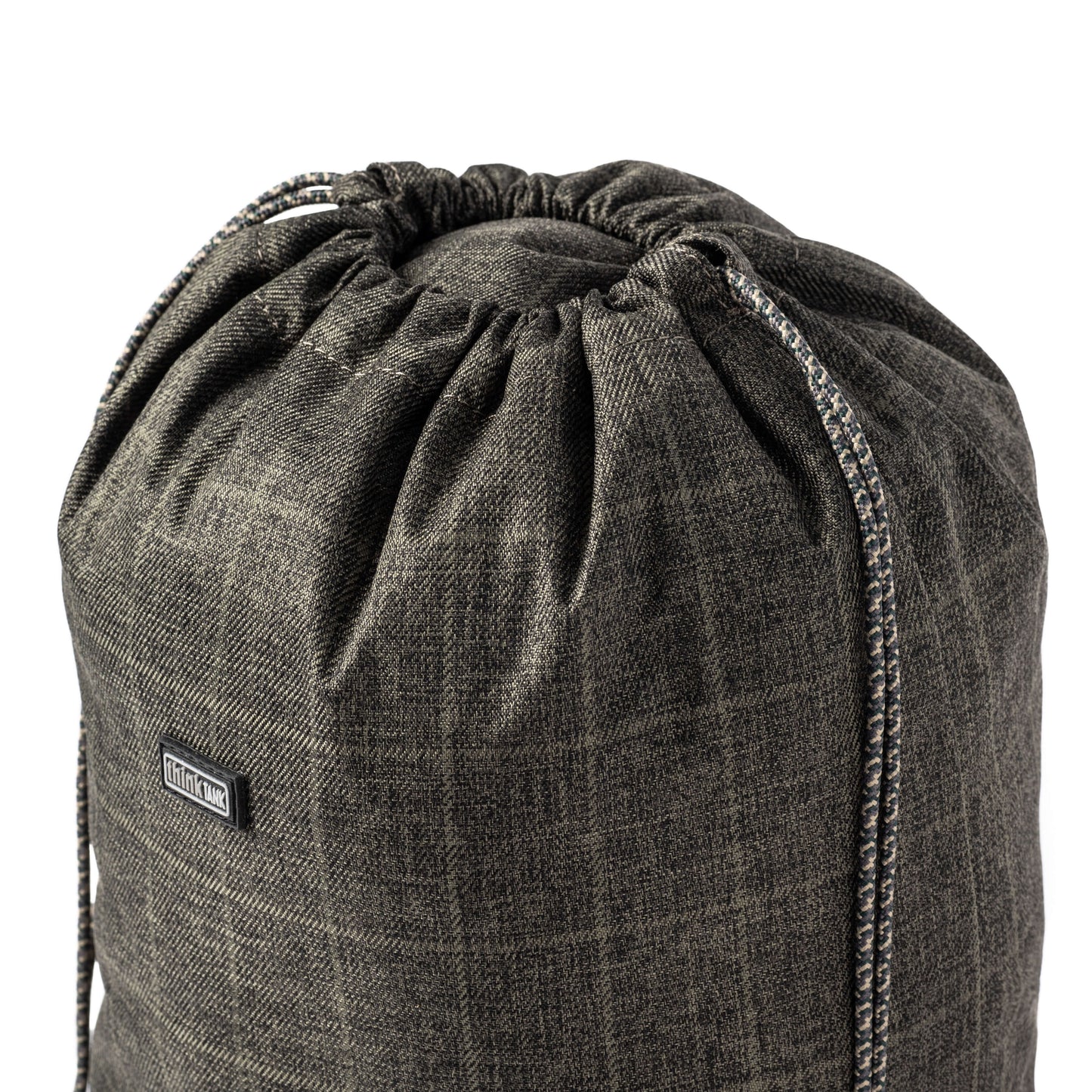 
                  
                    Drawstring cord closure secures contents and doubles as carry loops
                  
                