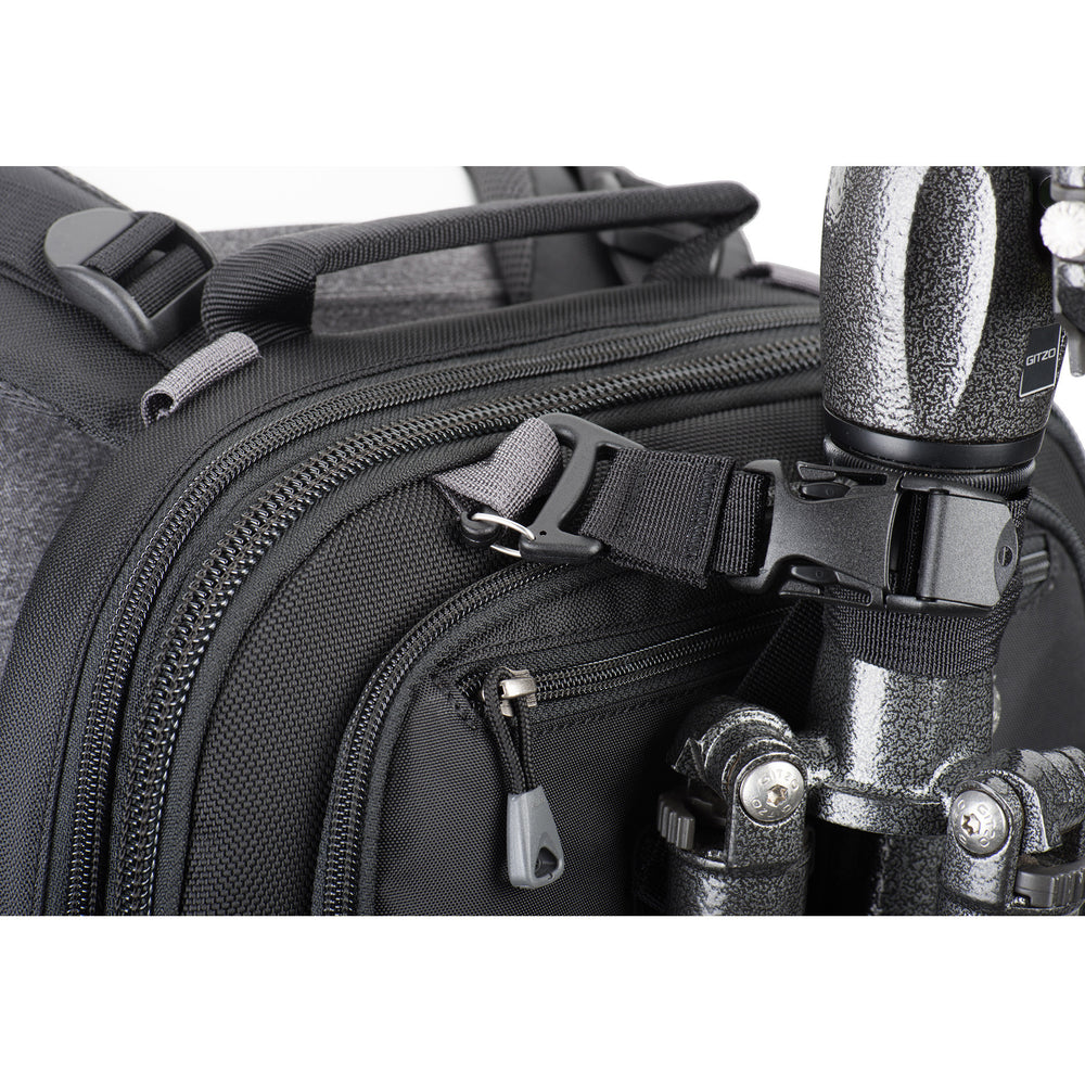 
                  
                    Outer tripod attachment allows gear to be accessed when the tripod is attached. Inner tripod attachment secures gear
                  
                