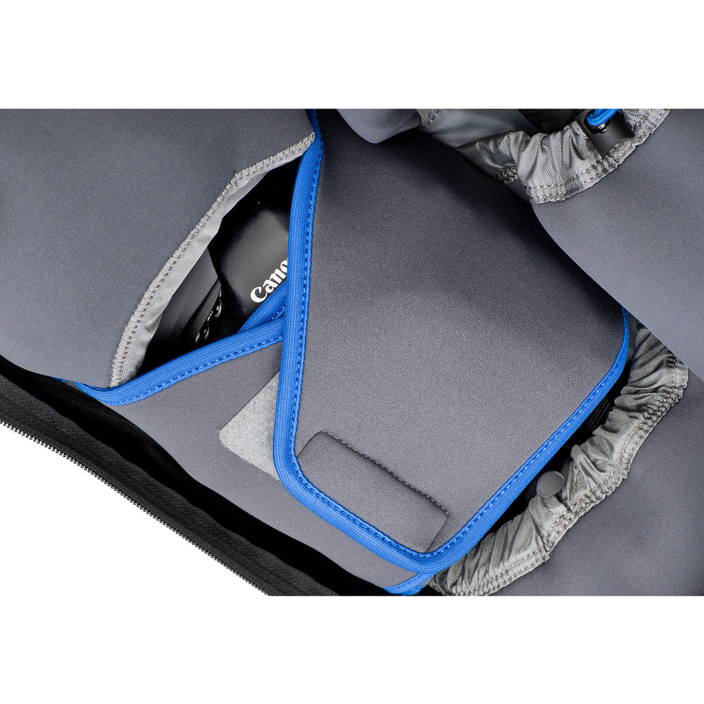 
                  
                    Neoprene pockets and wrap for cameras, lenses or personal items
                  
                