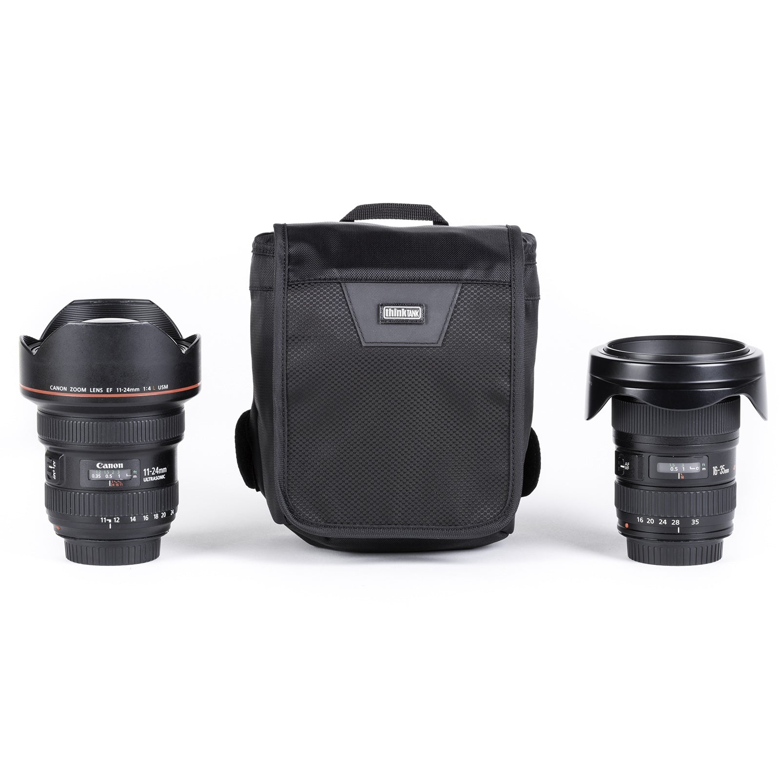 Lightweight compressible modular pouch holds wide-angle lenses with the hood attached and in the shooting position