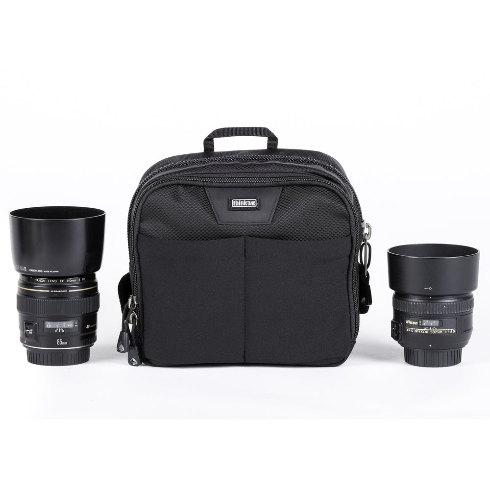 
                  
                    Utility bag for diverse carry options: most gripped DSLRs, 1–2 small lenses or 2 camera GoPro Kit
                  
                