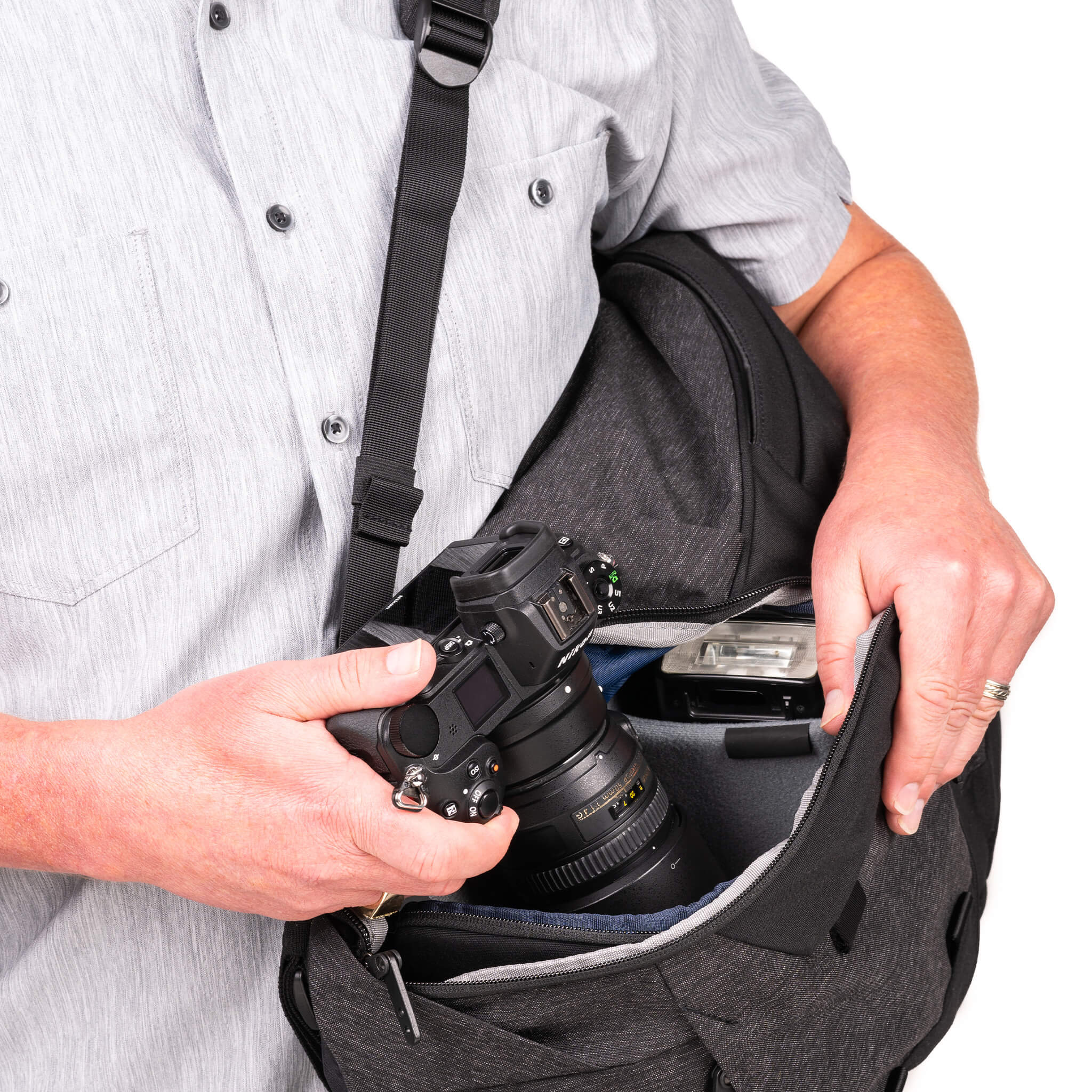 Lower compartment is easily accessed without taking off the backpack