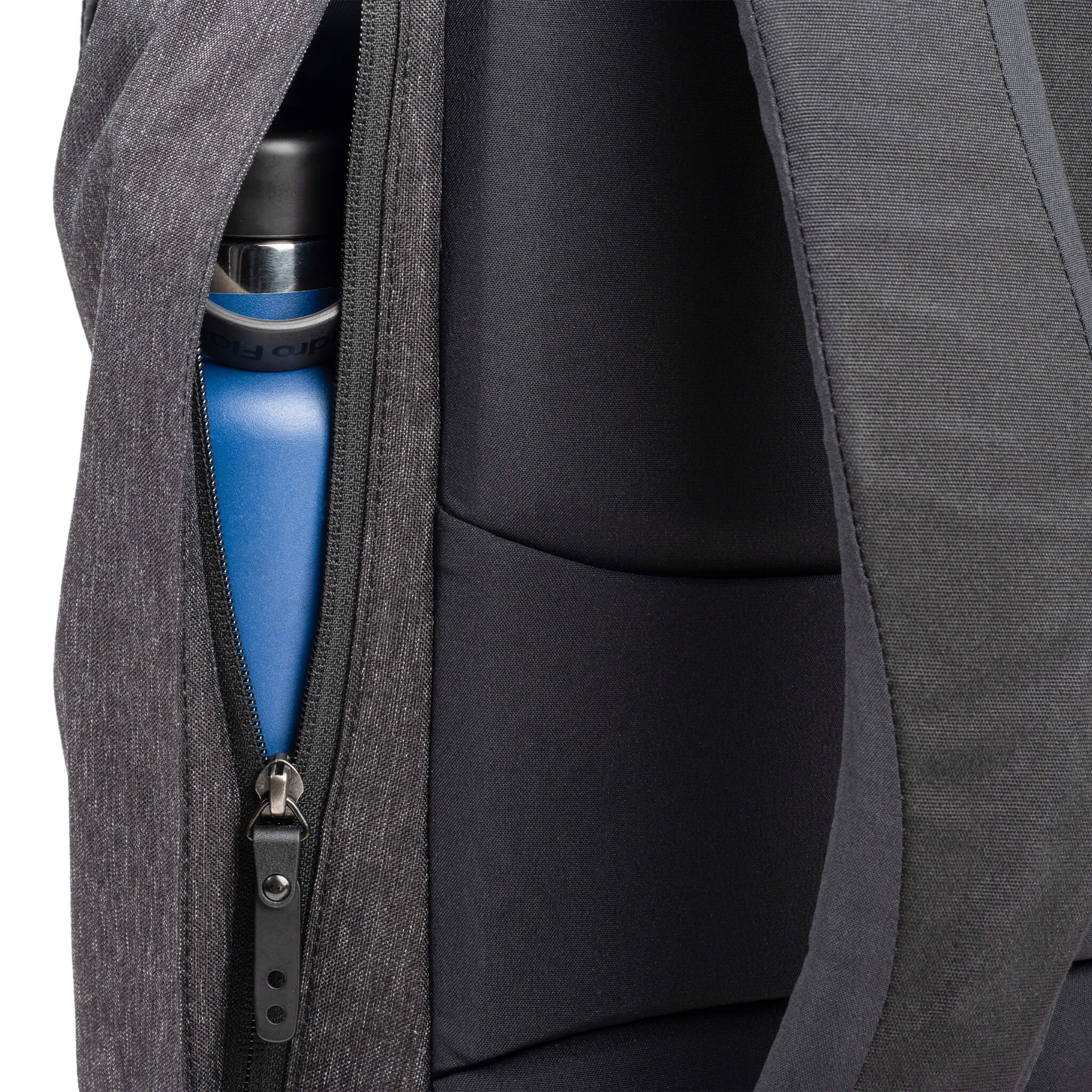 Zippered pocket on the right fits everything from light jacket to a water bottle (This pocket is accessible while wearing the pack)