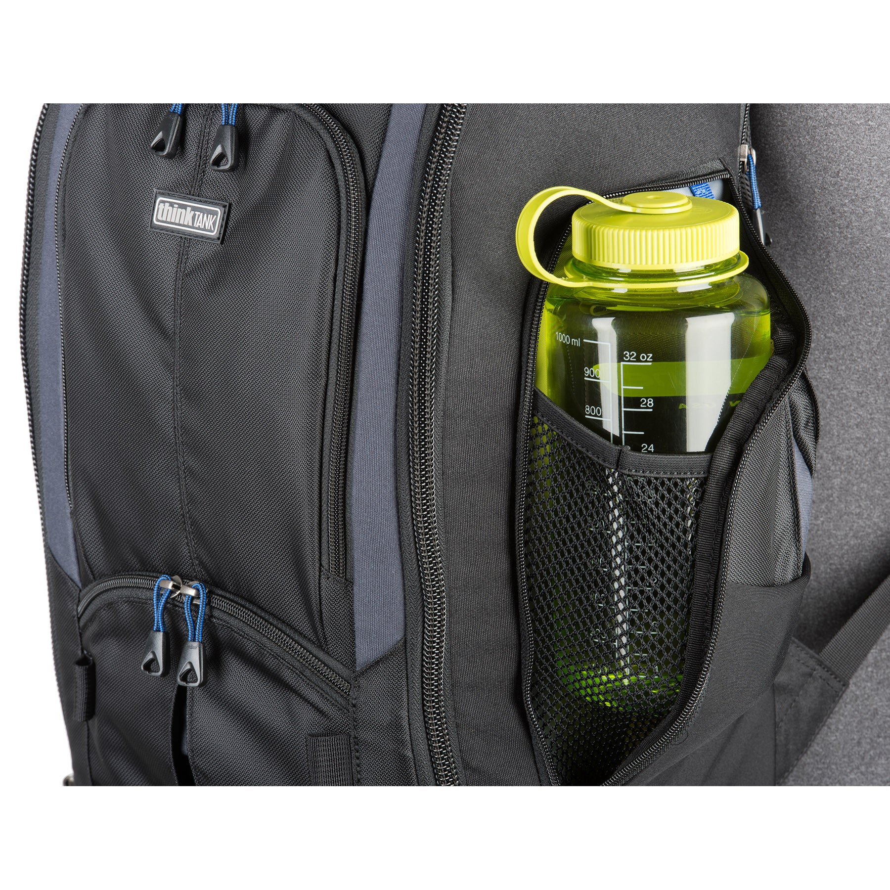 Two side water bottle pockets and two side zippered pockets