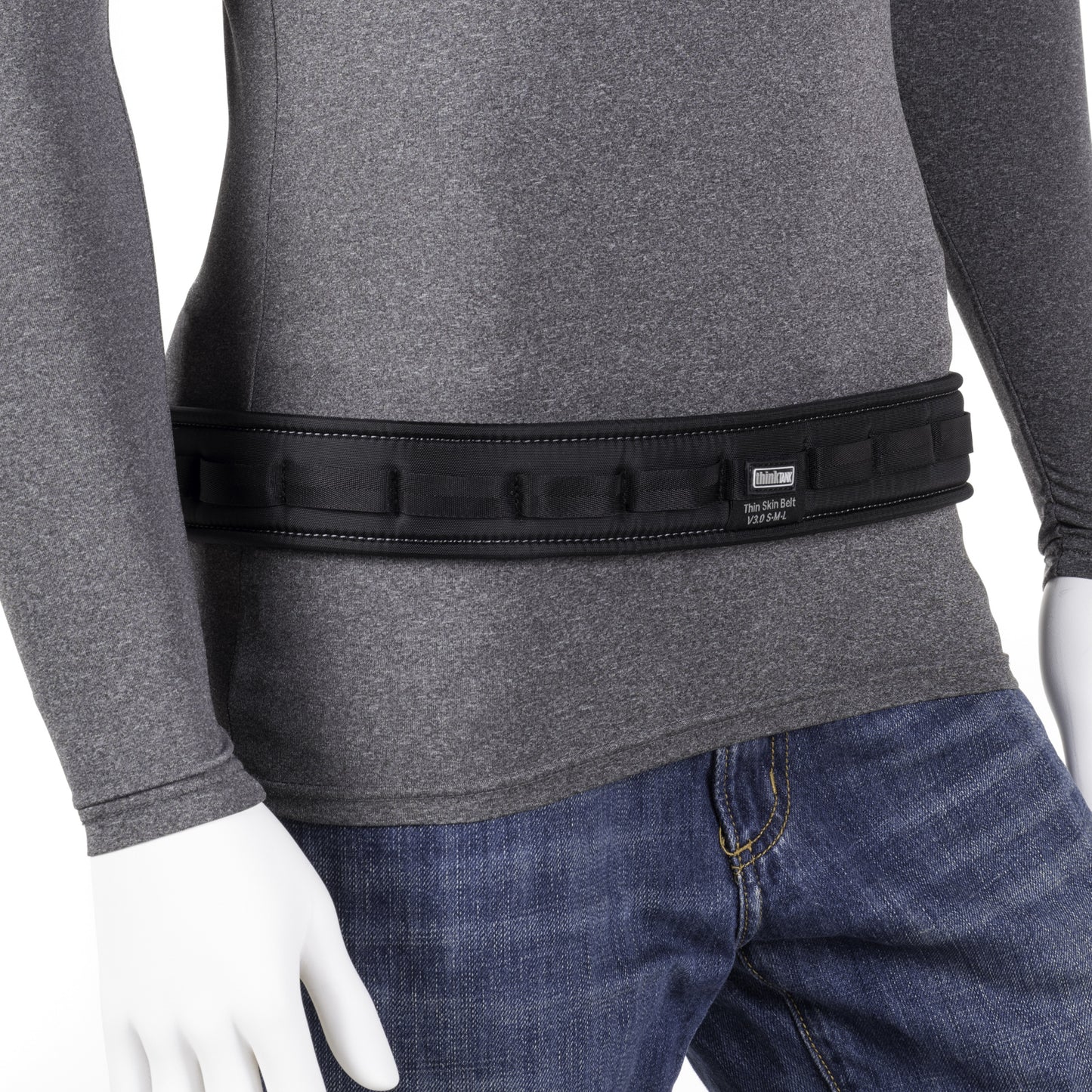 
                  
                    Thin belt with robust support for attaching modular components.
                  
                