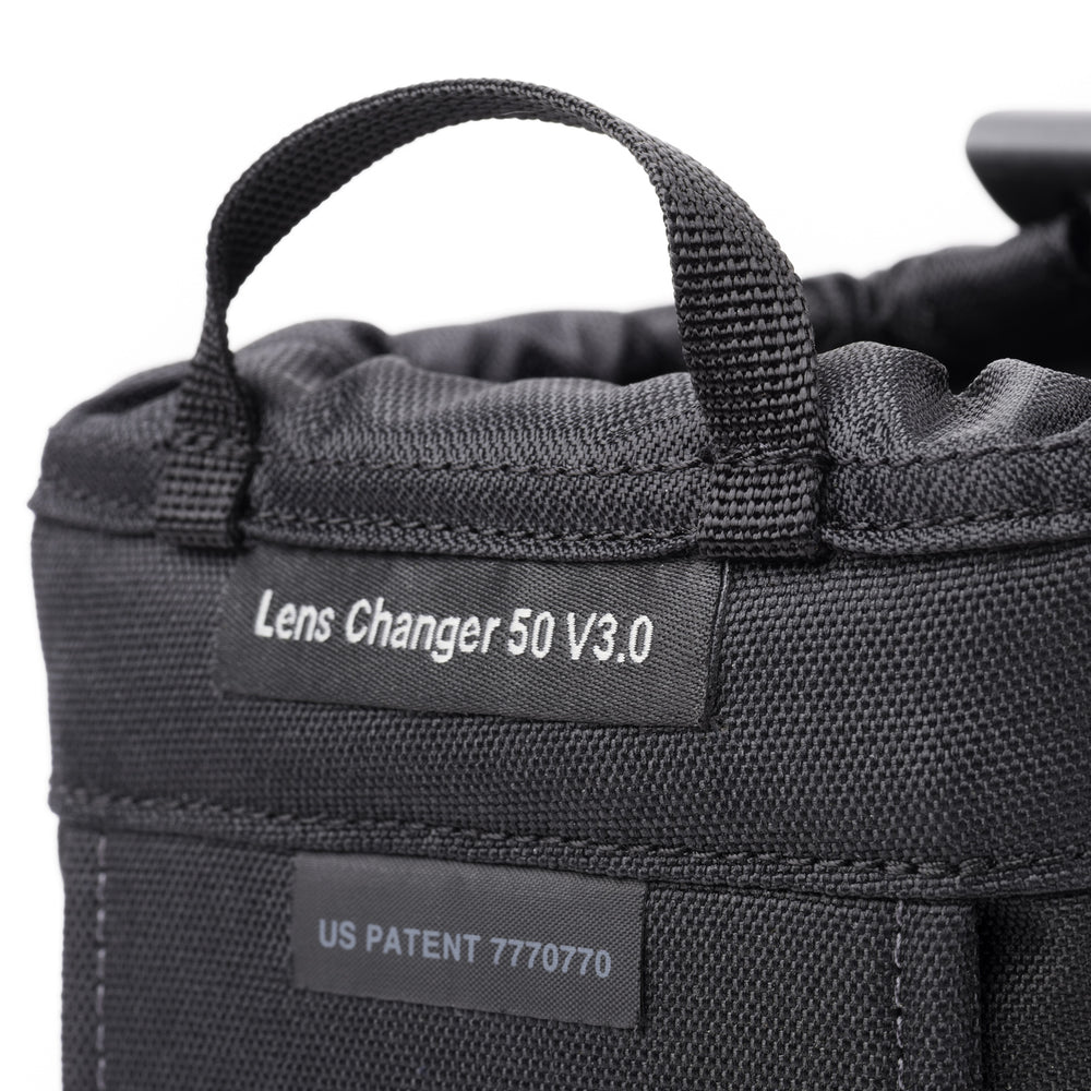 
                  
                    Modular pouch fits wide-angle lenses with hoods in shooting position.
                  
                