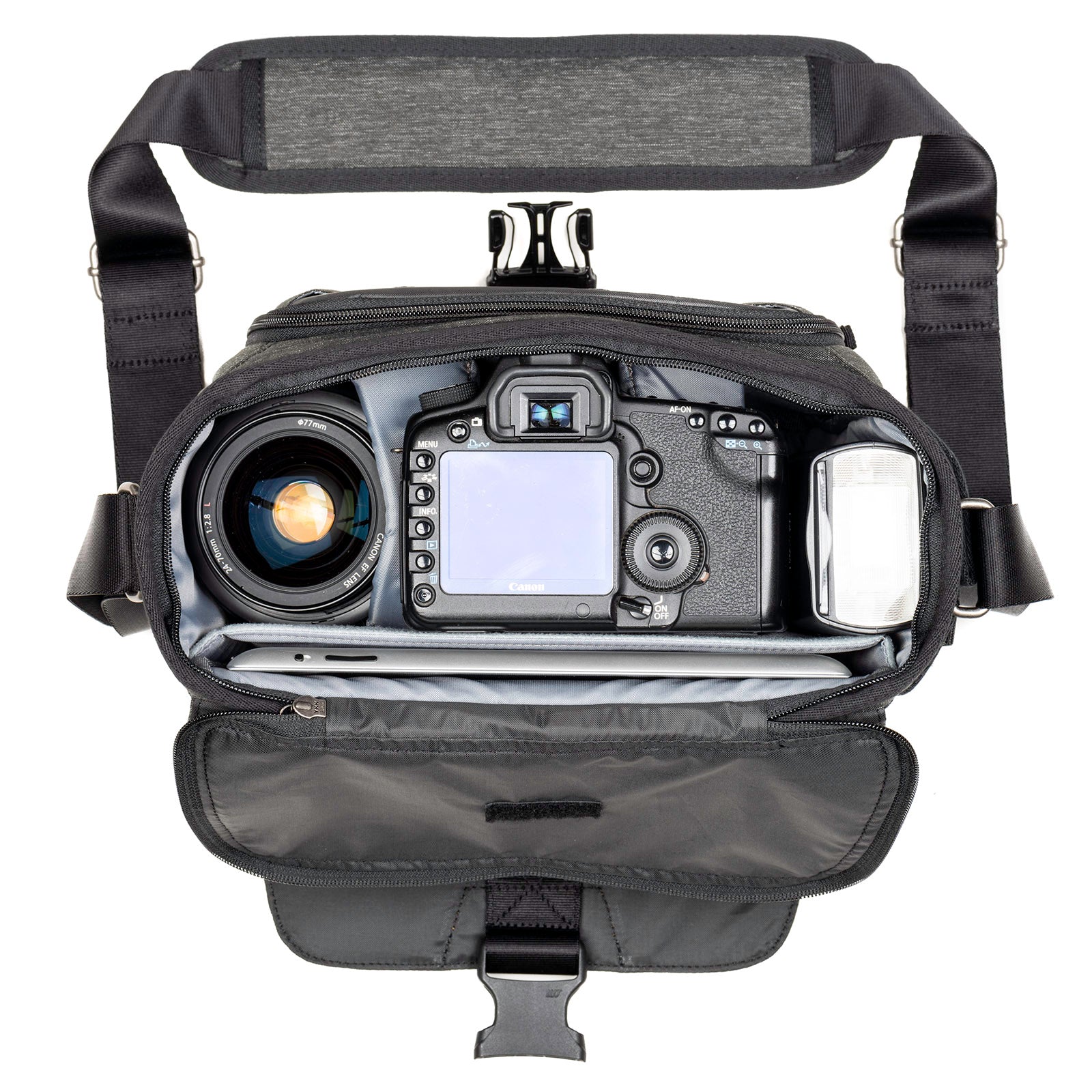 Fits one standard size body with a wide or short zoom plus 1–2 small extra lens, 10” tablet. Fits a 24–70mm f/2.8 detached. Fits a Mirrorless kit with 3–4 lenses including the 50–140mm