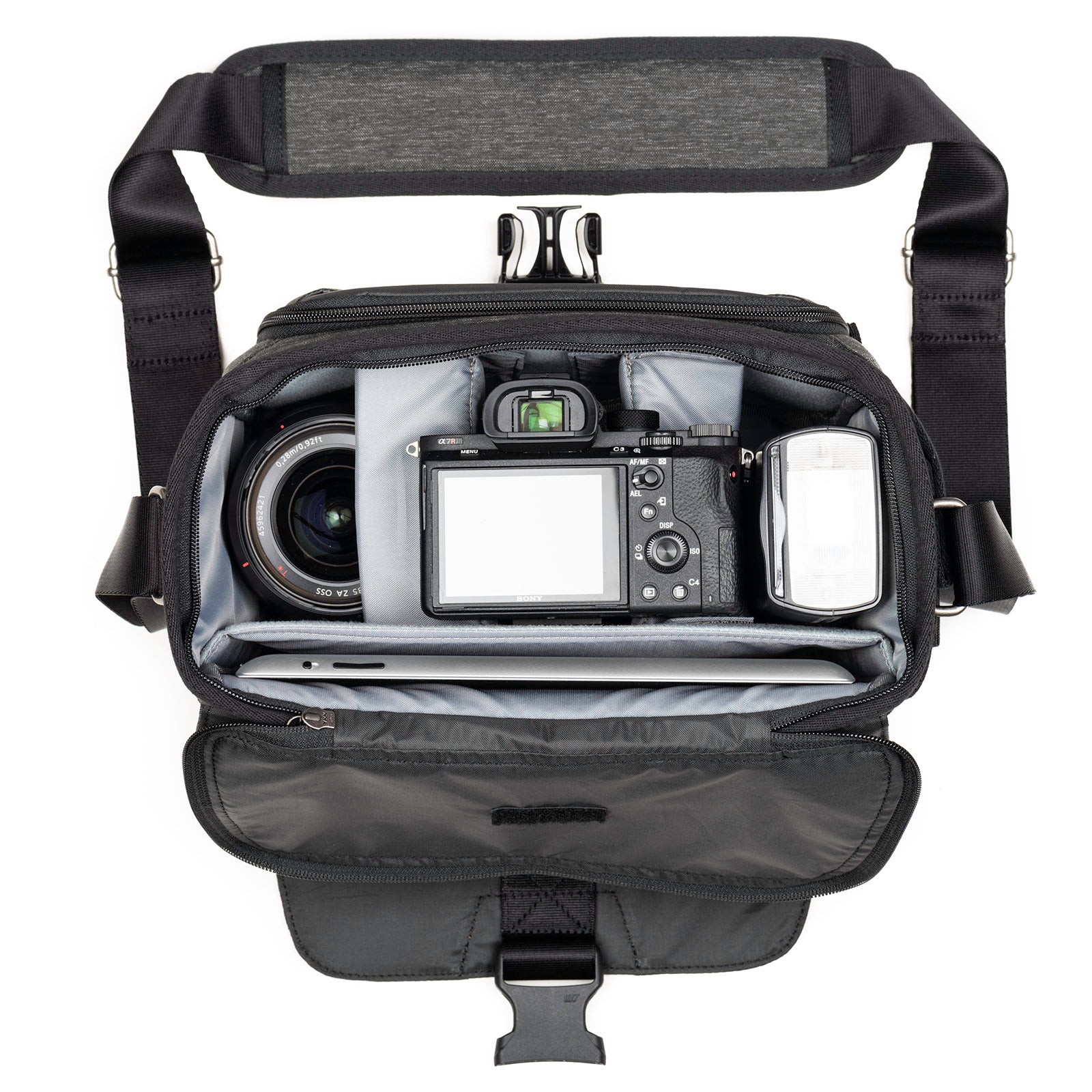 Fits one standard size body with a wide or short zoom plus 1–2 small extra lens, 10” tablet. Fits a 24–70mm f/2.8 detached. Fits a Mirrorless kit with 3–4 lenses including the 50–140mm