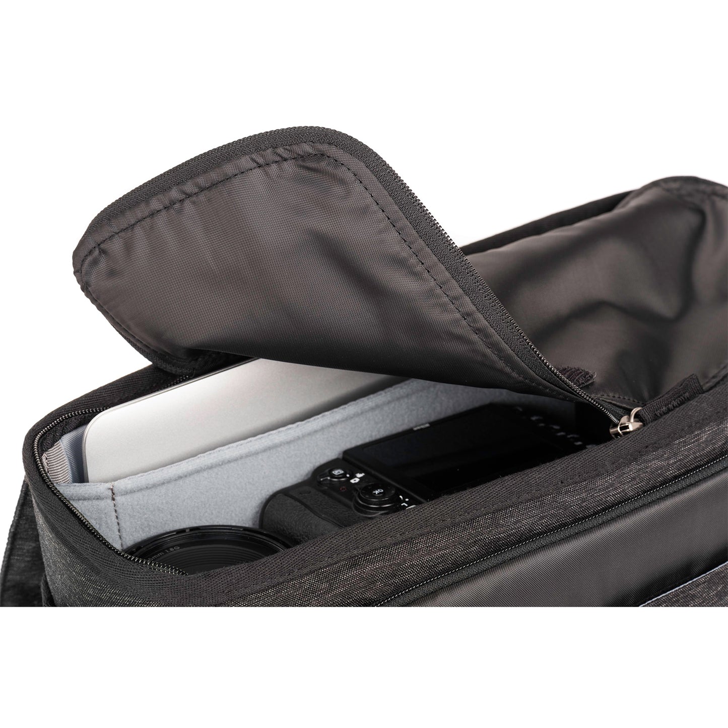 
                  
                    Interior zippered flap provides a secure closure, weather barrier and protection from theft. Tucks away when not in use.
                  
                