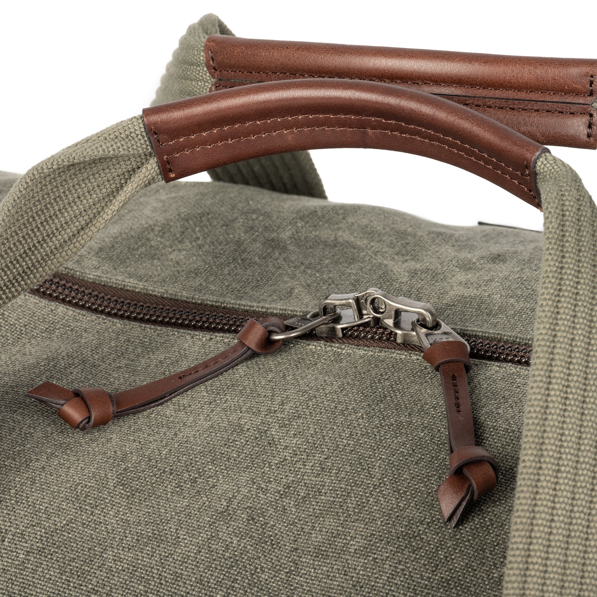Full-grain Dakota leather zipper pulls