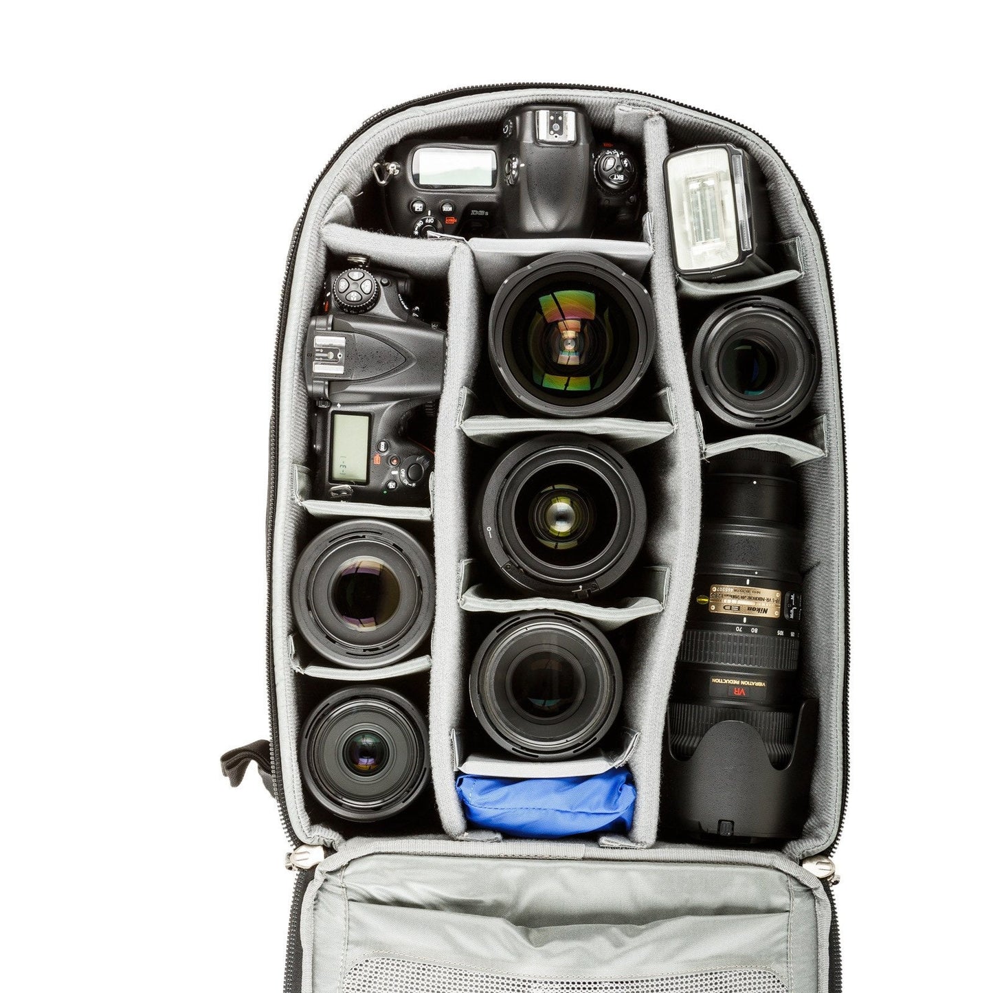
                  
                    Two gripped DSLRs, seven lenses, flash
                  
                