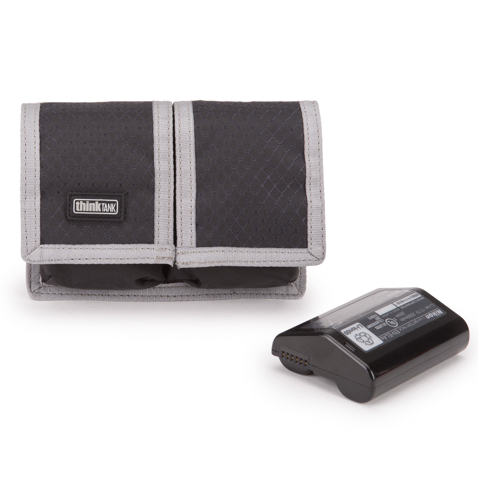 Soft, compact case for carrying two pro-size DSLR batteries